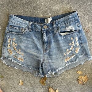 Free People Distressed Blue Jean Shorts with embroidered accents